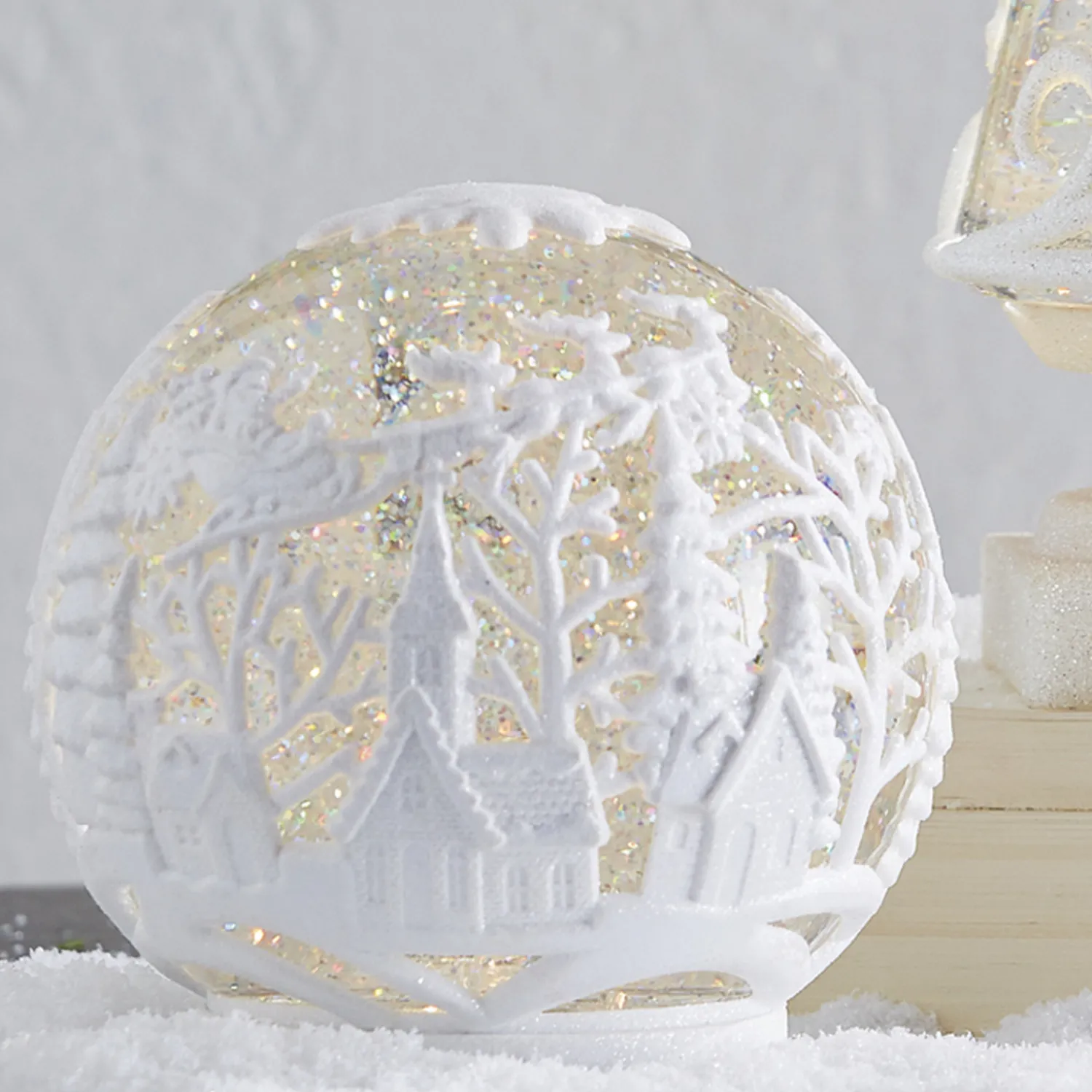 The Jolly Christmas Shop Raz 6.25" Town Scene Glittered Embossed LED Lighted Water Globe Christmas Decoration 4119076